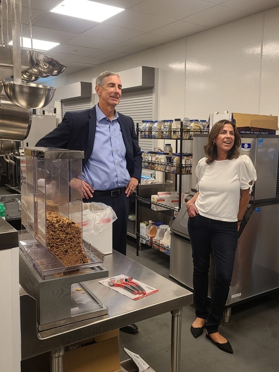 Pictured Left to Right: San Mateo County Executive Mike Callagy and Assemblymember Diane Papan in the kitchen of the San Mateo County Navigation Center